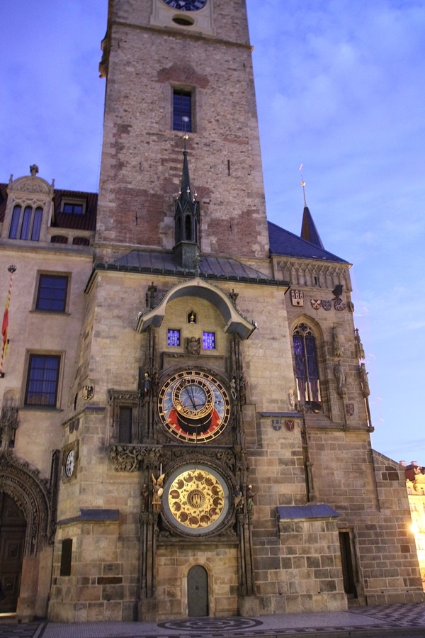 A large clock tower at dawn