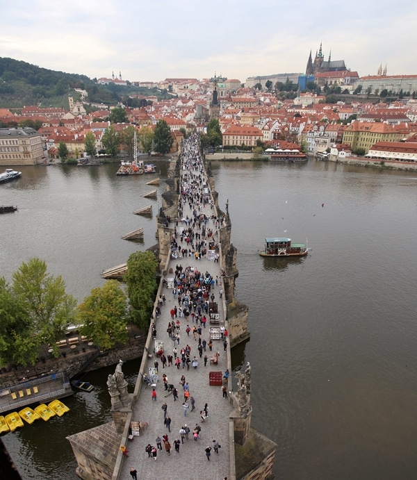 view of Charles Bridge and Prague Castle from a bridge tower