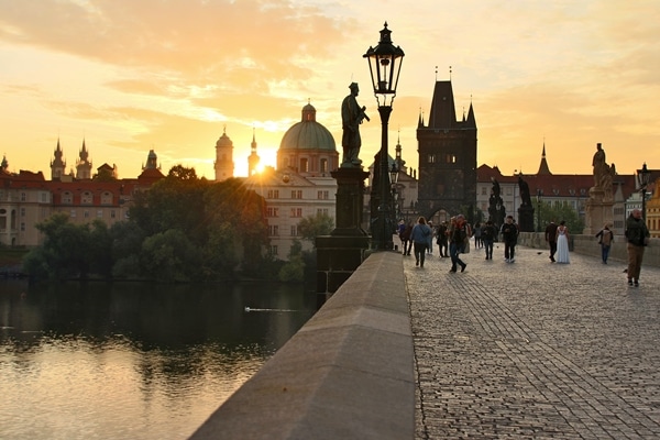 sunrise over the Charles Bridge and Vltava River in Prague