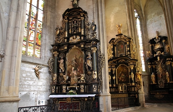 ornate altars inside a church