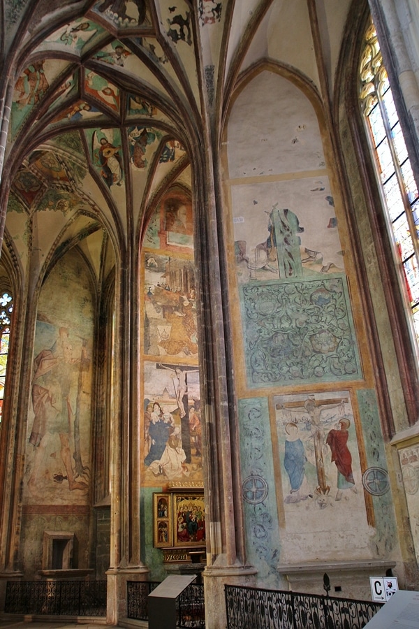 large colorful frescoes inside a church