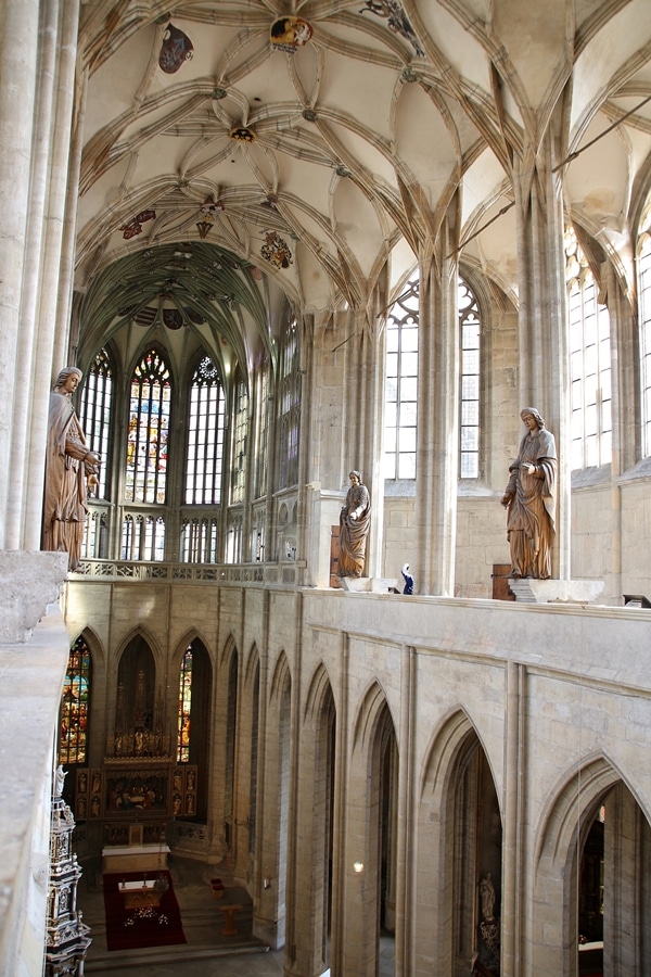 view of the interior of a large church from the upper level