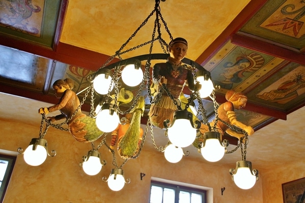 a colorful lighting fixture in a restaurant