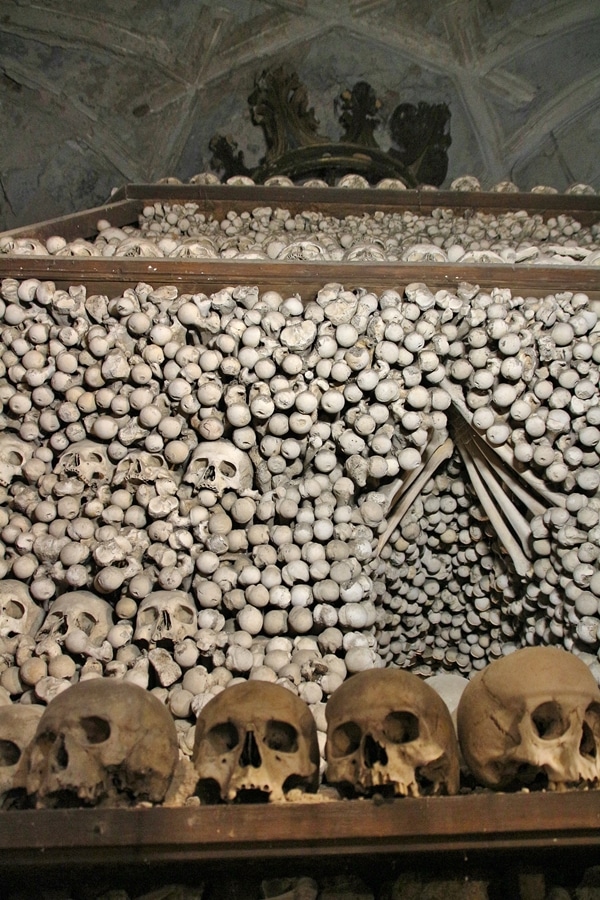 a pile of human bones in a bone church