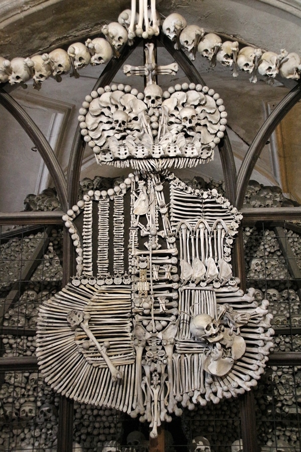 closeup of a family shield made of human bones