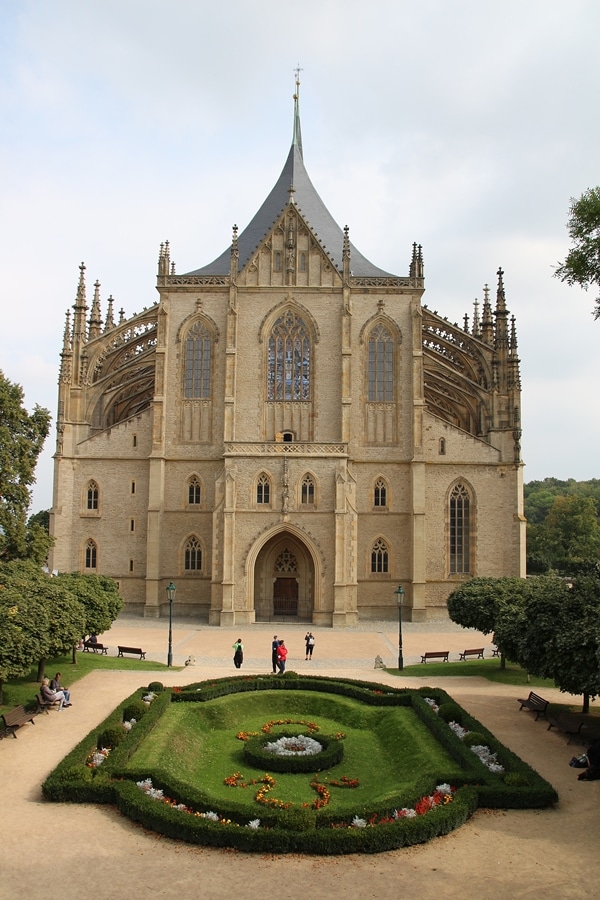 A large church surrounded by greenery