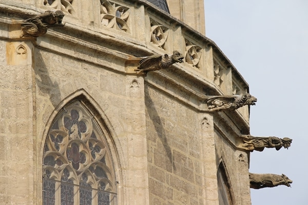 gargoyles outside a large stone church