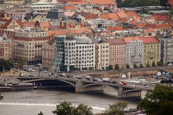 a view of the Dancing House in Prague from a distance