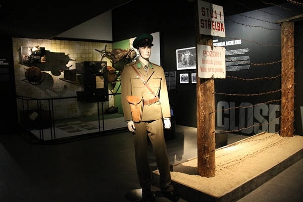 a museum display with a man in uniform