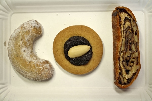 3 varieties of cookies on a white plate