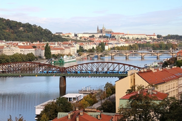 A train crossing a bridge over a body of water