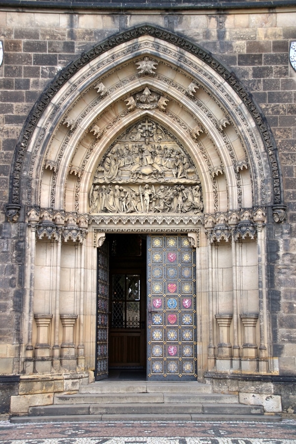 ornate entrance to an old church in Prague