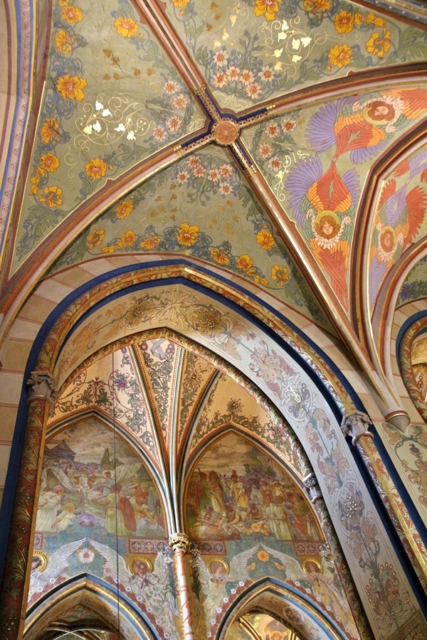 brightly painted vaulted ceilings inside church