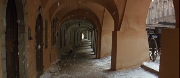 screenshot from the film Amadeus of a snow-covered walkway