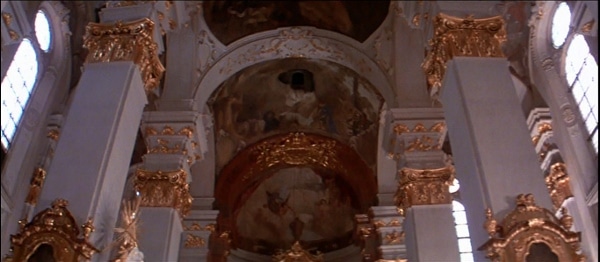 a screenshot from the movie Amadeus of the inside of a church