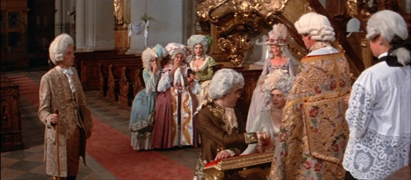 a screenshot from the movie Amadeus of a wedding