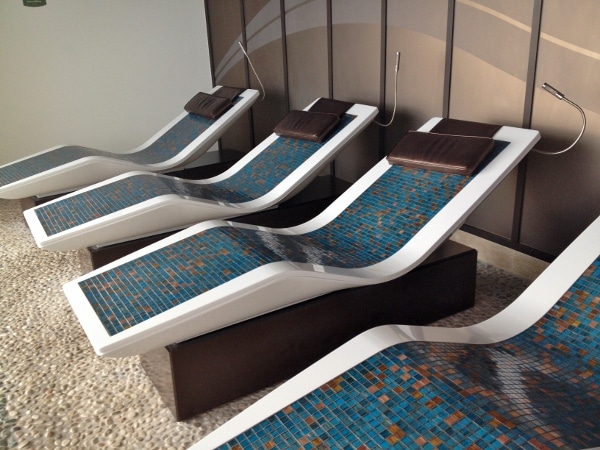 blue tile sun-chairs in a spa