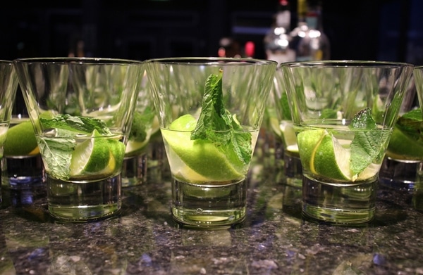 glasses of partially made mojitos