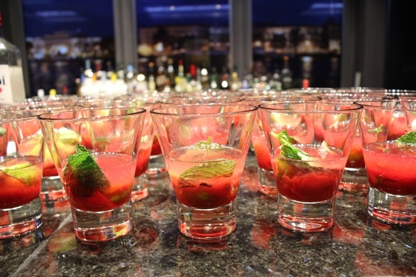 glasses of partially made raspberry mojitos