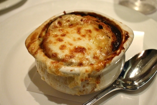 bowl of French onion soup with melted cheese on top