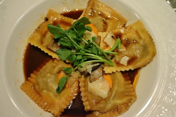 ravioli in a brown broth