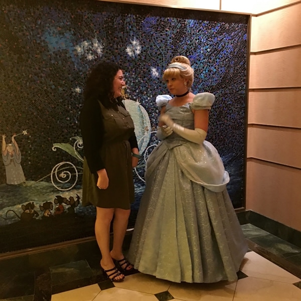 A woman posing with Cinderella