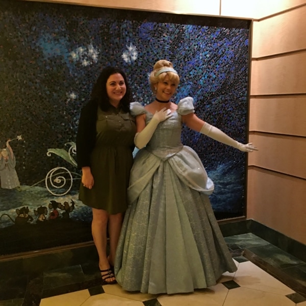 A woman posing with Cinderella