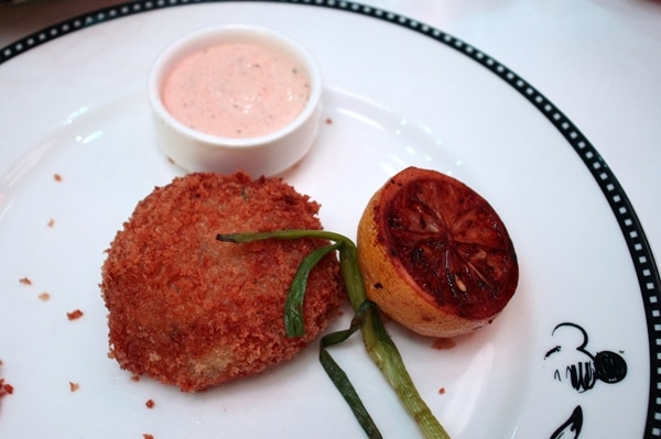 a crab cake with grilled lemon