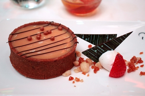 an individual sized tart on a plate