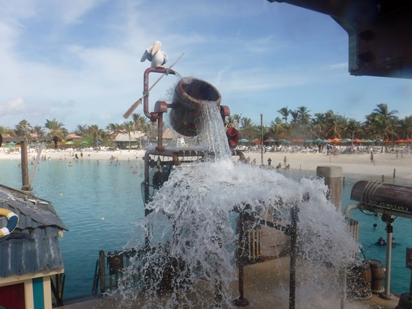 water dumping over a splash area at the beach