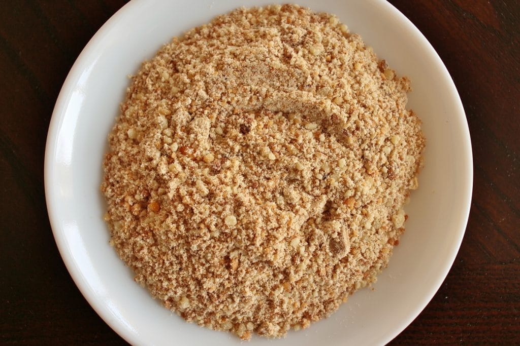 Ground mahleb (Middle eastern spice) on a small white plate