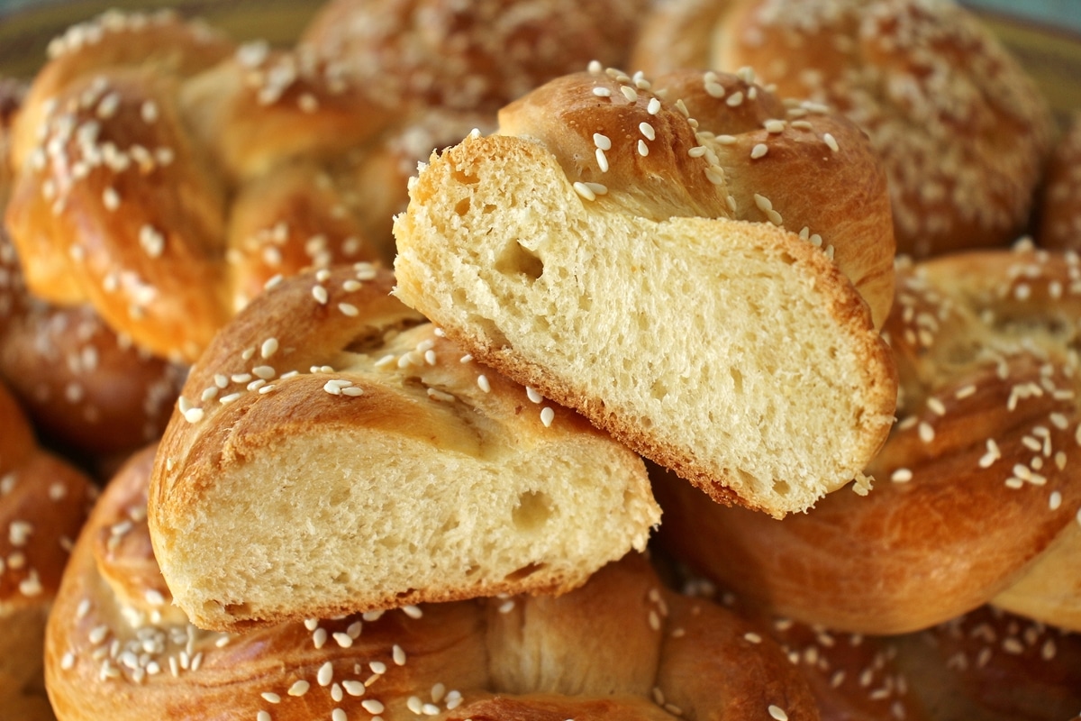 Close up of a chorek (Armenian sweet bread) cut in half to show a cross-section.