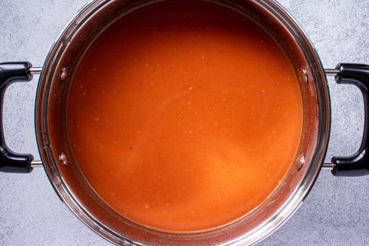 Polish tomato soup in a medium pot after adding heavy cream.