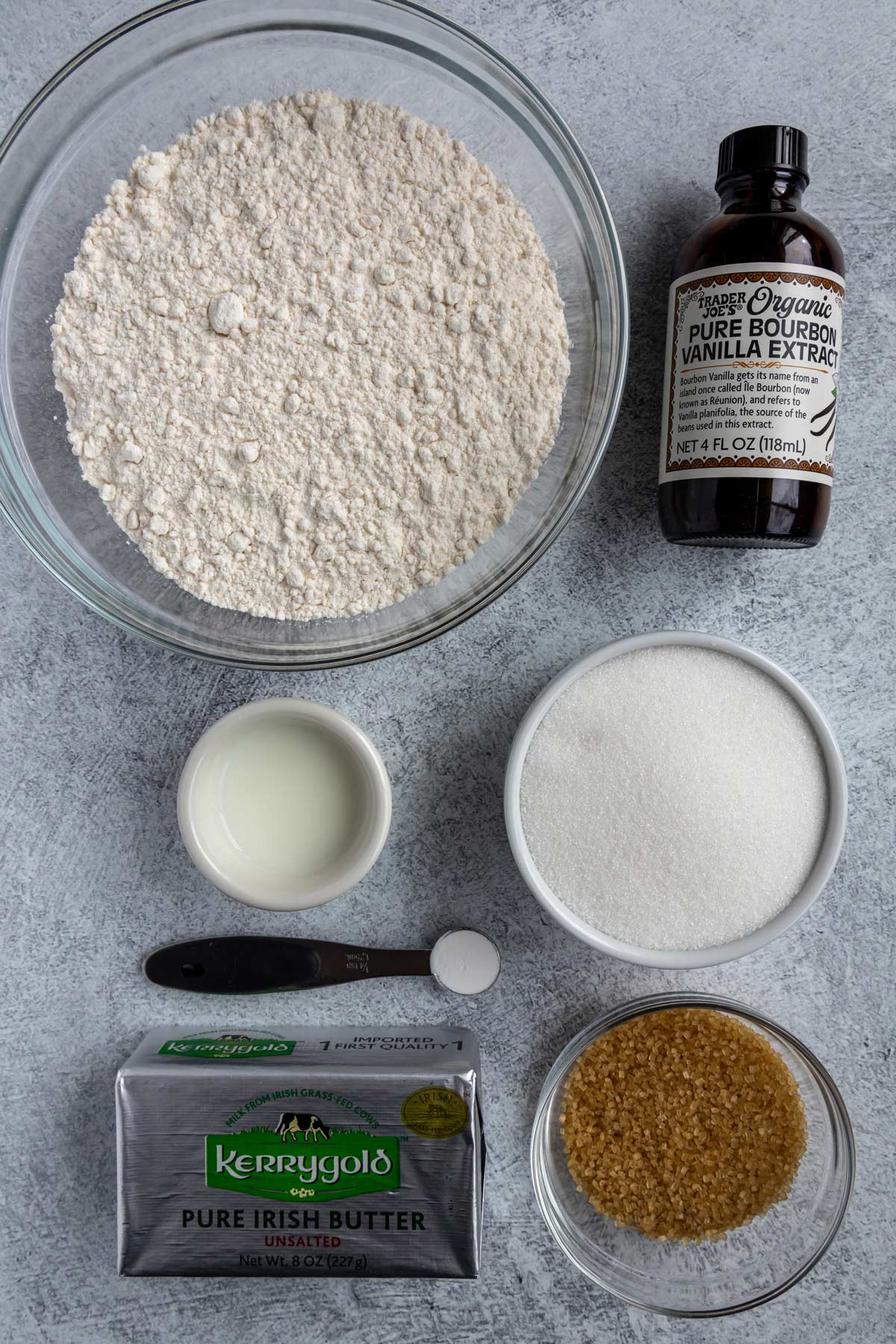 Ingredients for heidesand brown butter shortbread cookies on a light grey background.