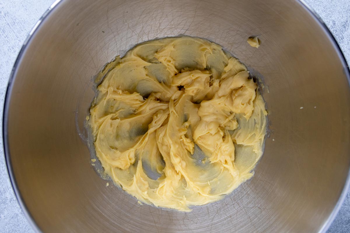 Soft brown butter beaten until creamy in a metal mixing bowl.