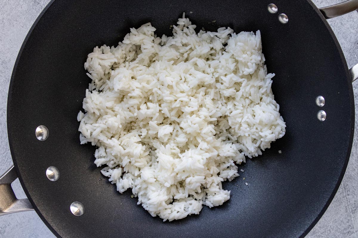 Cooked rice in a wok.