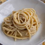 A bowl of bucatini cacio e pepe.