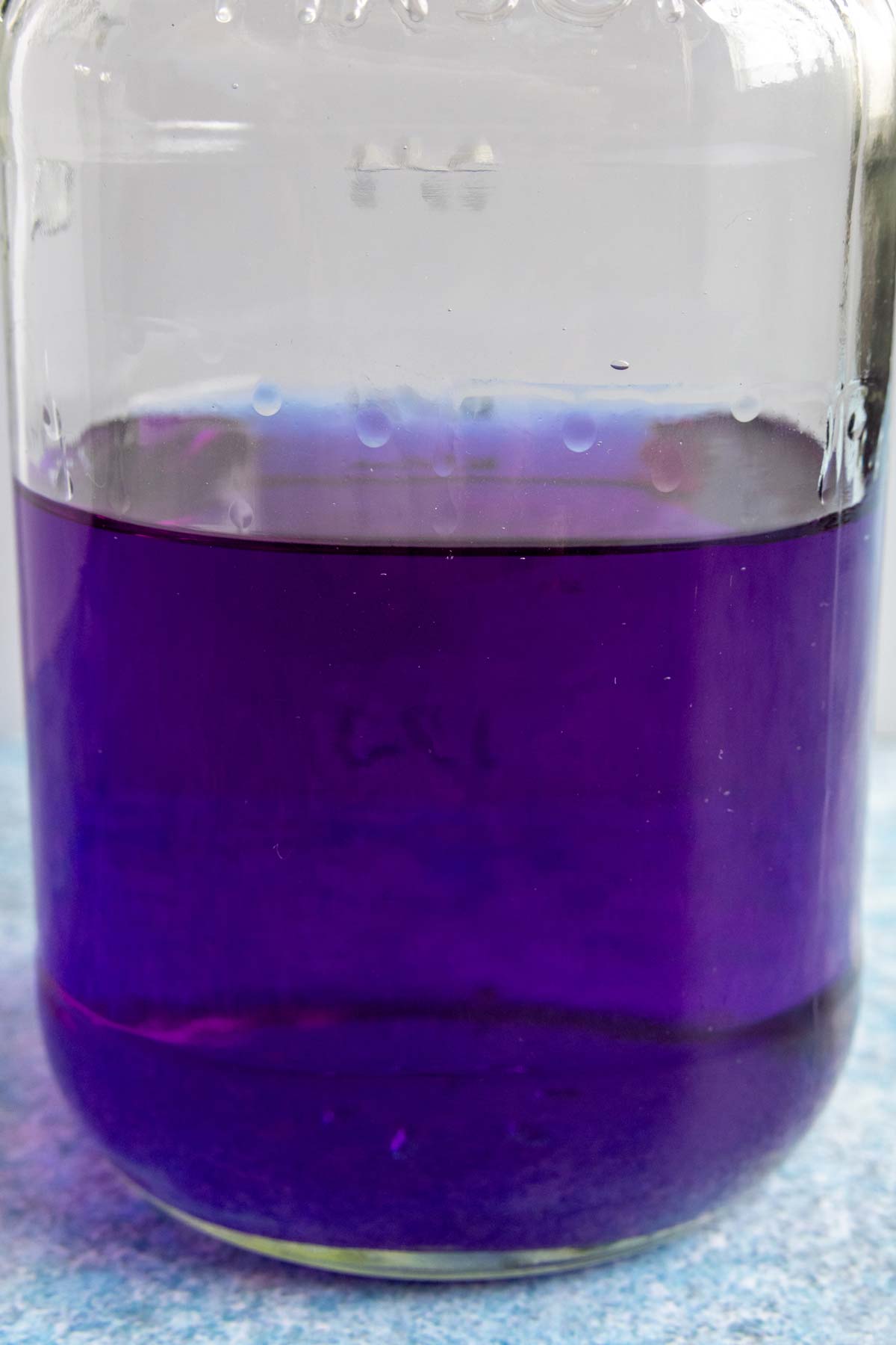 A jar of dark indigo liquid.