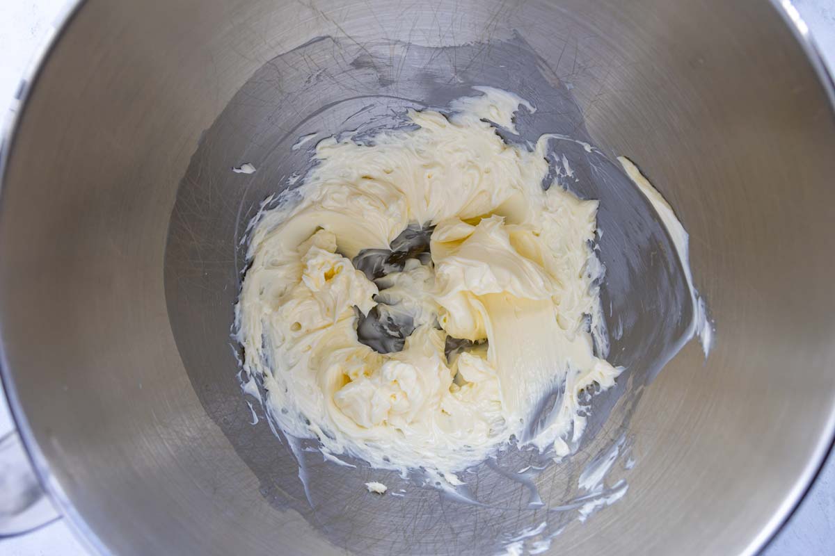 Soft butter beaten until smooth in a metal mixing bowl.