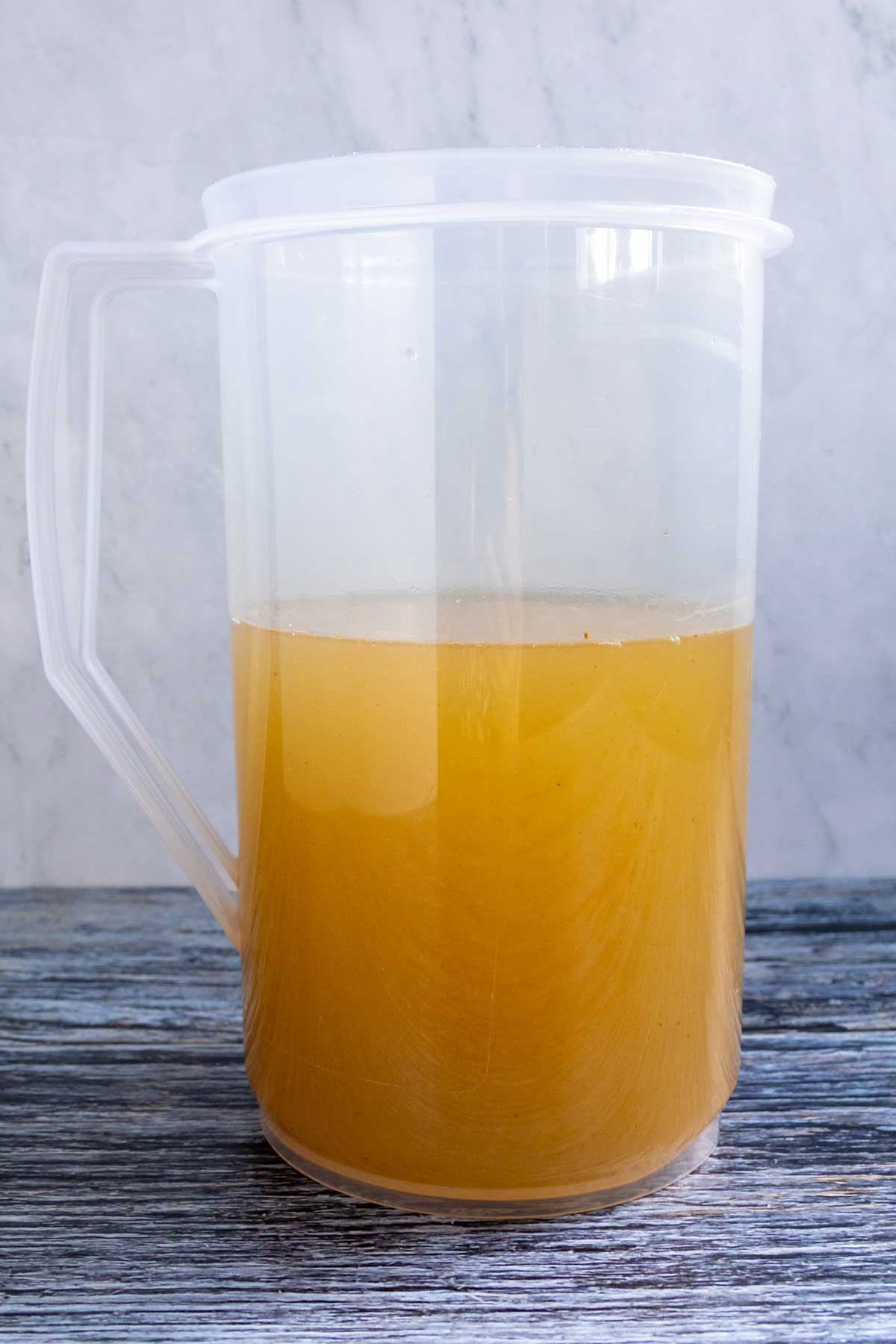 A pitcher filled with Shikanji / Nimbu Pani (Indian spiced lemonade).