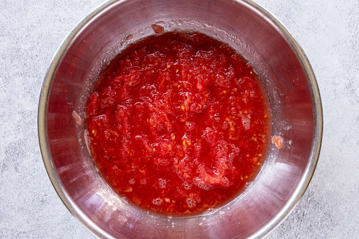 A bowl of grated tomato.
