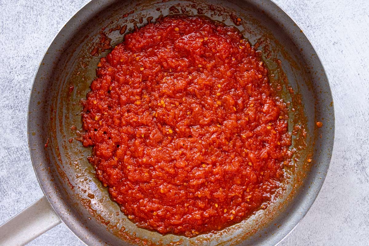 Grated tomato and olive oil after reducing to a thick paste in a nonstick skillet.