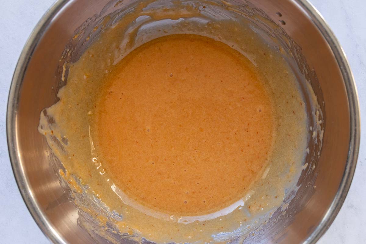 Sauce choron in a metal mixing bowl.