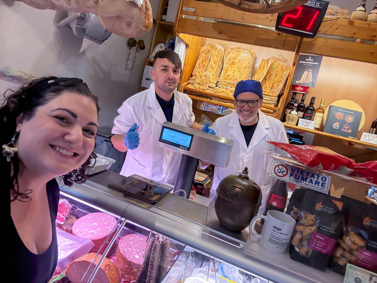 Victoria, Claudio, and Luca inside La Vita e un Mozzico in Rome.