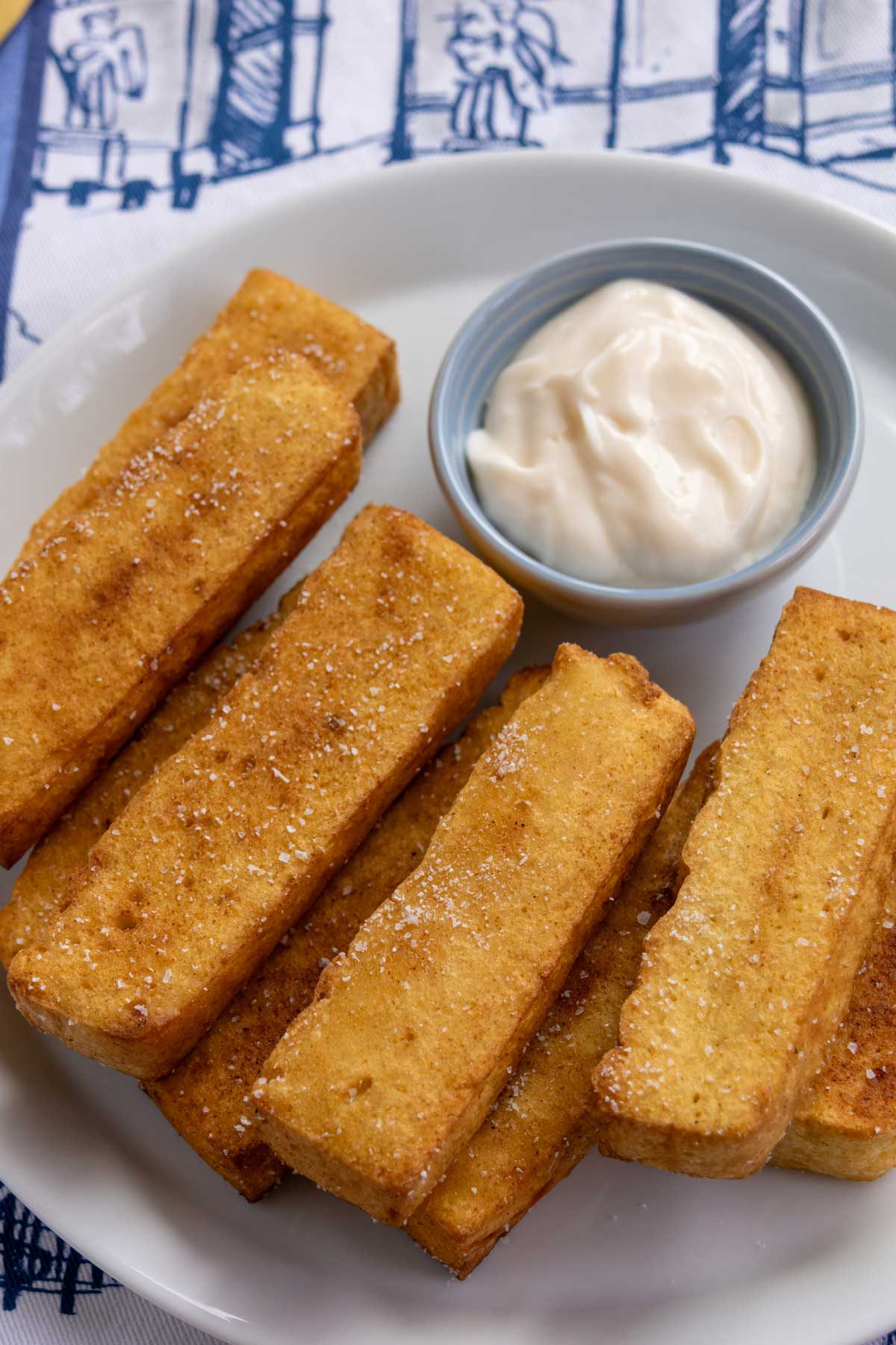 Thick-cut chickpea fries sprinkled with flaky kosher salt.