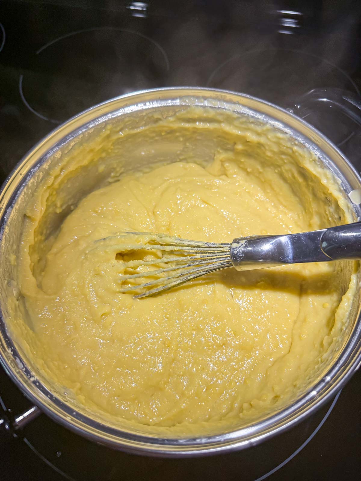 A somewhat thick mixture of chickpea flour whisked into simmering water on the stovetop.